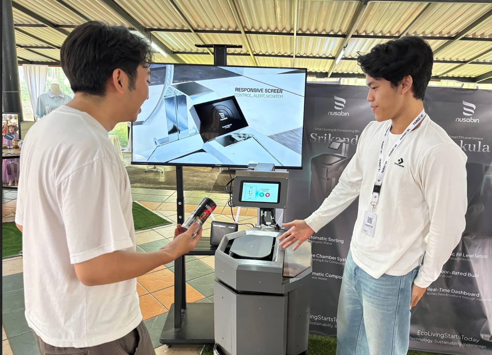 Visitors interacting with the Srikandi smart waste bin at Pielfest 2025
